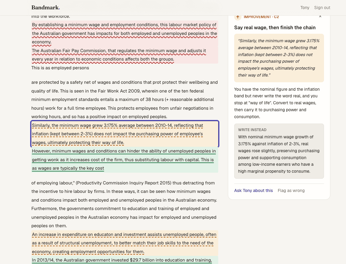 A marked Bandmark essay: highlighted sentences with a feedback card